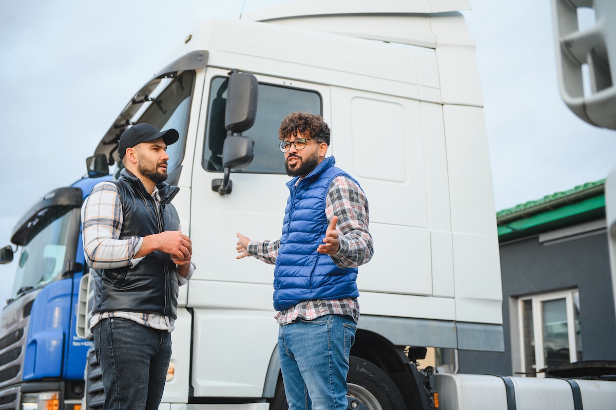 Truckers having a conversation.